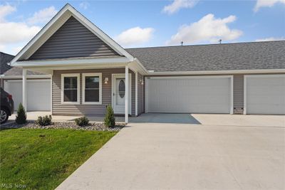 Single story home with garage and a front lawn | Image 2