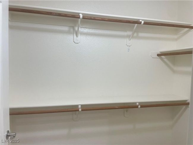 View of walk in closet | Image 17