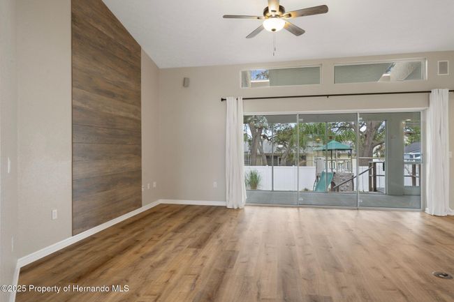 11242 Riddle Dr, House other with 3 bedrooms, 3 bathrooms and null parking in SPRING HILL FL | Image 11