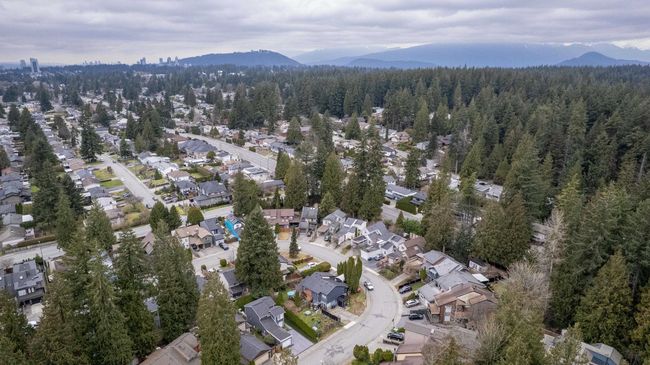 Drone / aerial view featuring a forest view, a mountain view, and a residential view | Image 21