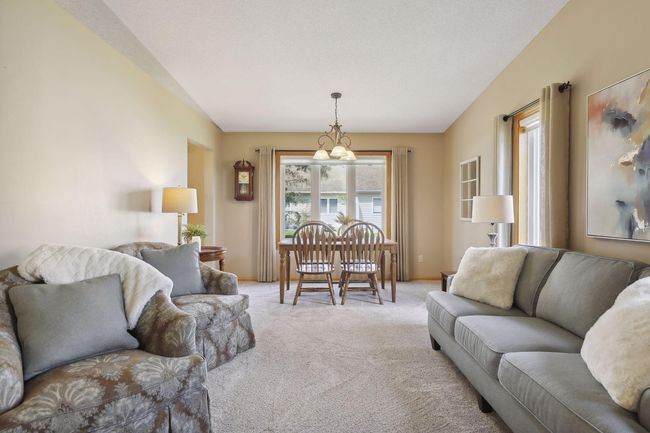 Enjoy the abundance of natural light that pours into your living/dining room. | Image 7