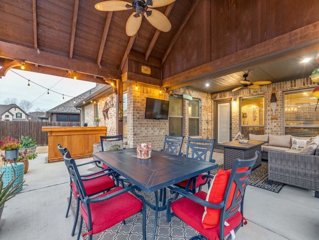 Custom Master Patio featuring a gazebo, ceiling fan, and outdoor lounge area | Image 17