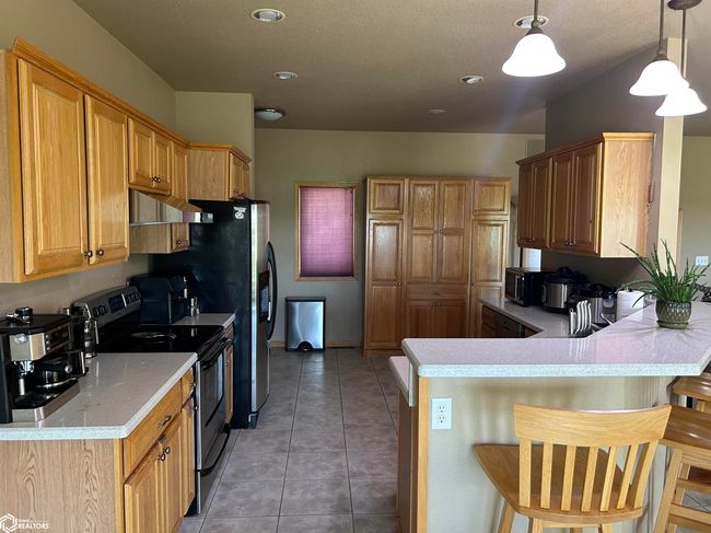 1206 Woodland Dr, House other with 4 bedrooms, 3 bathrooms and null parking in Carroll IA | Image 5