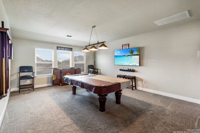 An elegantly appointed game room, thoughtfully des | Image 26
