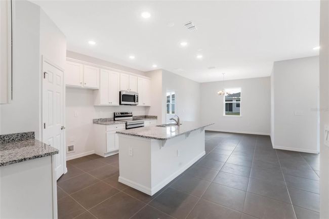 8928 Nuthatcher Dr, House other with 3 bedrooms, 2 bathrooms and null parking in LEESBURG FL | Image 25