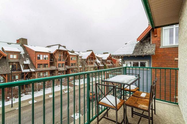 307 - 176 Kananaskis Way, Condo with 2 bedrooms, 1 bathrooms and 2 parking in Canmore AB | Image 25