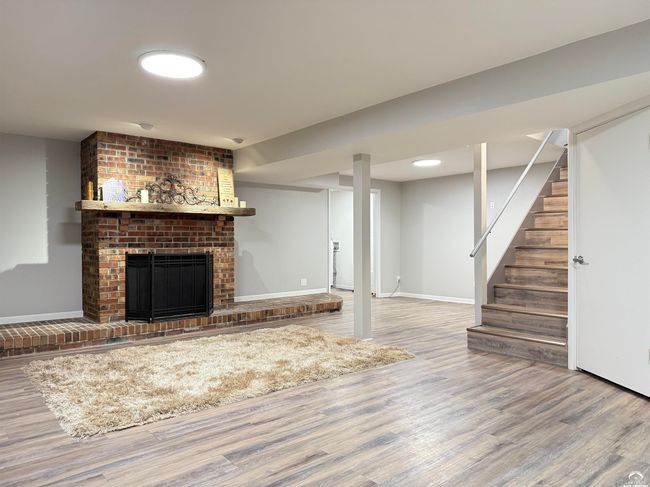 The fireplace is capped off; it's currently unsafe to burn. Use for Media or safer electric insert | Image 36