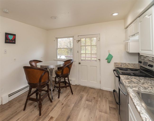 Eik with granite counter top and recessed lighting | Image 7