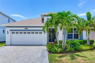 5227 Wishing Arch Drive, House other with 4 bedrooms, 3 bathrooms and null parking in Apollo Beach FL | Image 1