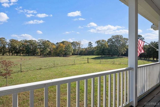 View of yard with a rural view and fence | Image 43