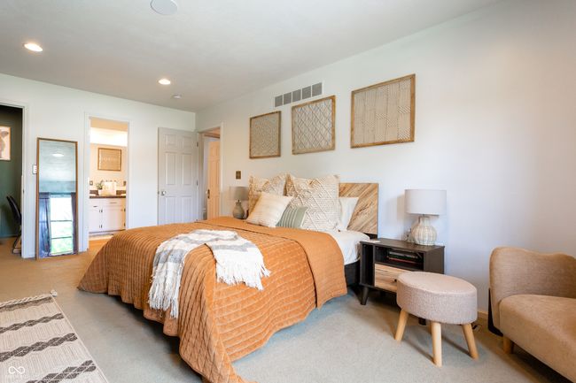 bedroom with light carpet, recessed lighting, and ensuite bath | Image 26