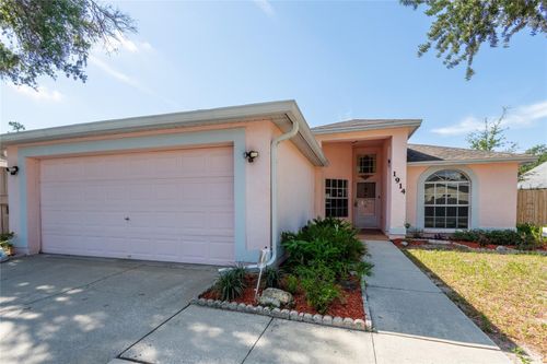 1914 Woodcut Dr, Lutz, FL, 33559-3365 | Card Image