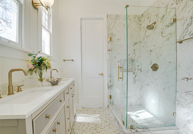 Bathroom with an enclosed shower and vanity | Image 28