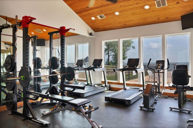 Gym with wooden ceiling, recessed lighting, and lofted ceiling | Image 17