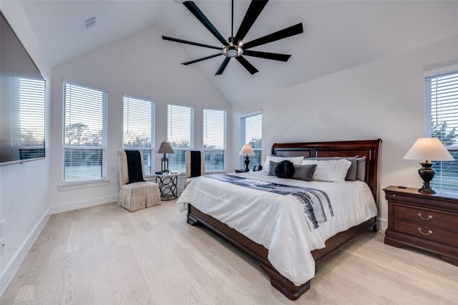 Spacious bedroom flooded with light | Image 17