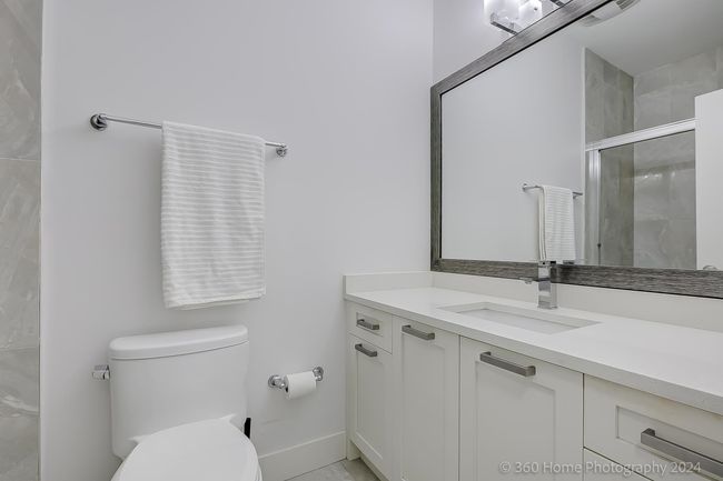 Full bath featuring vanity and a stall shower | Image 9
