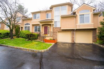 82 Kingsland Circle, Townhouse with 4 bedrooms, 2 bathrooms and null parking in South Brunswick NJ | Image 2