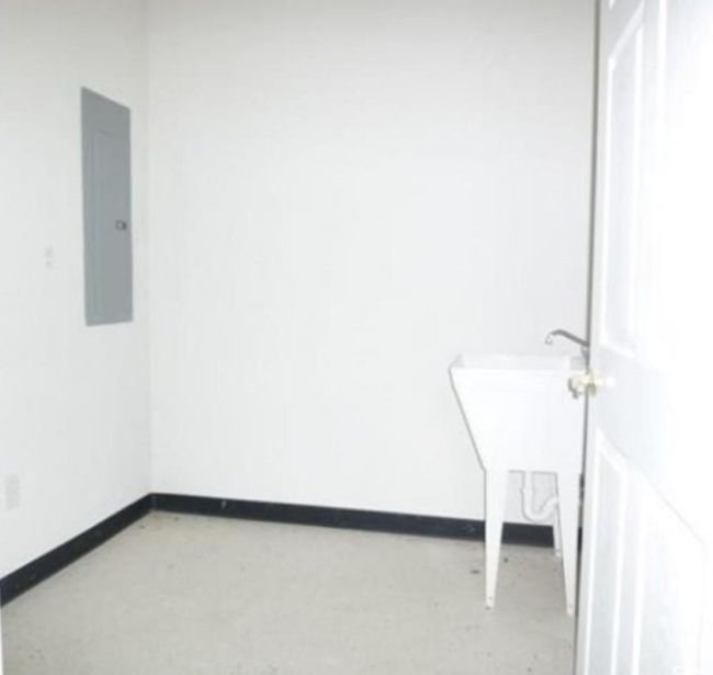 Unfurnished room featuring electric panel | Image 5