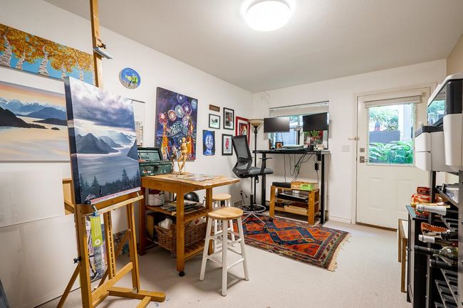 Dining room with carpet | Image 19