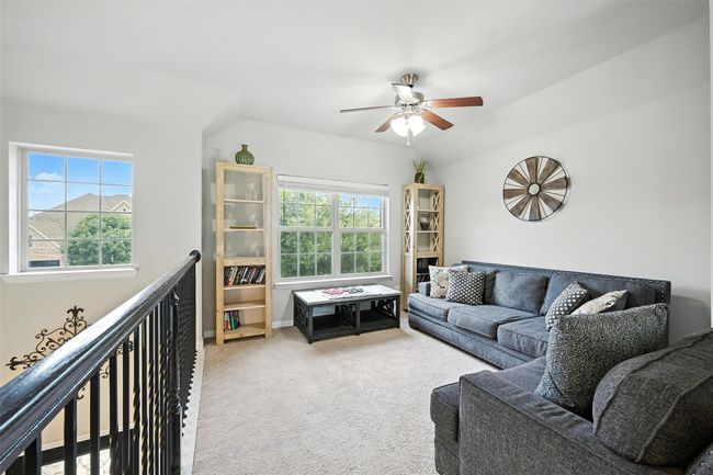 Upstairs Living room with plenty of natural light, ceiling fan, and carpet flooring | Image 19