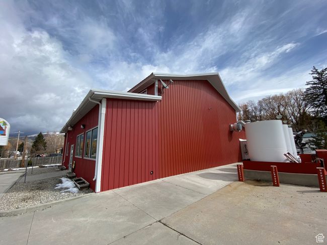 View of side of home featuring fence | Image 12