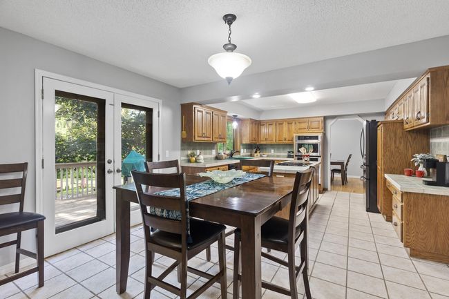 Informal dining with walk out to the deck | Image 12
