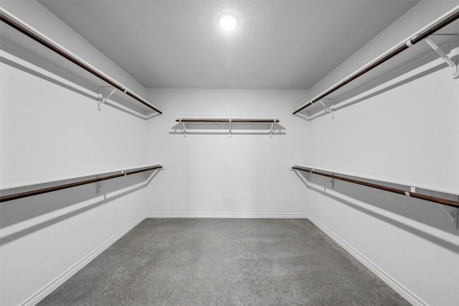 View of walk in closet | Image 12