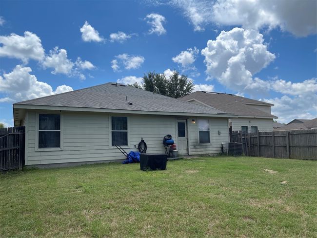 Rear view of house featuring brand new roof | Image 16