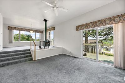 Cozy livingroom with views of the lake | Image 3