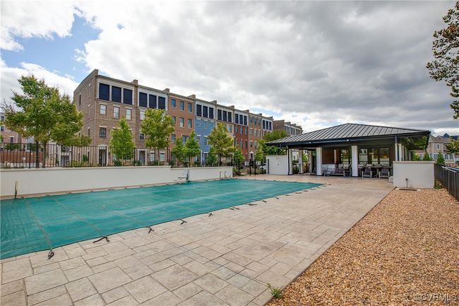 Pool featuring a patio and fence | Image 50
