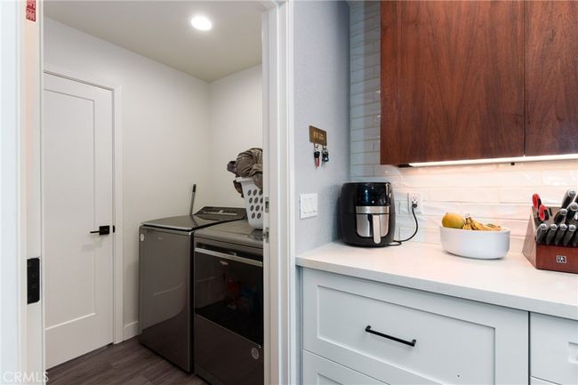 laundry room off kitchen door to ADU | Image 29