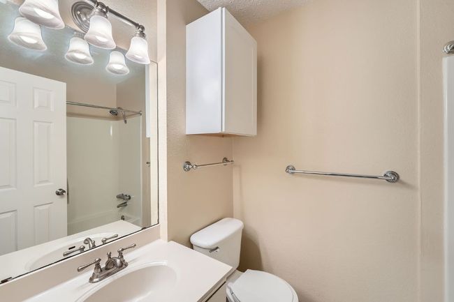 Primary bathroom features a tub/shower combo. | Image 8
