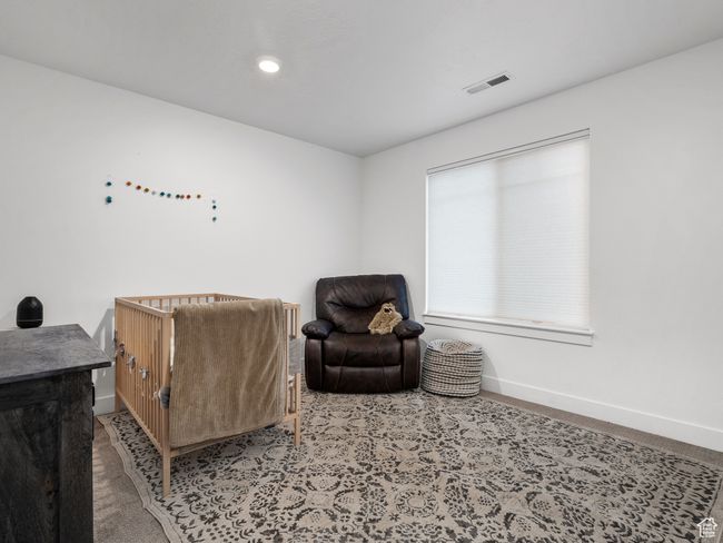 Sitting room with carpet floors and recessed lighting | Image 41