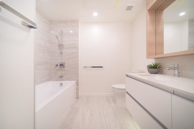 Full bath featuring vanity, bathing tub / shower combination, and recessed lighting | Image 14