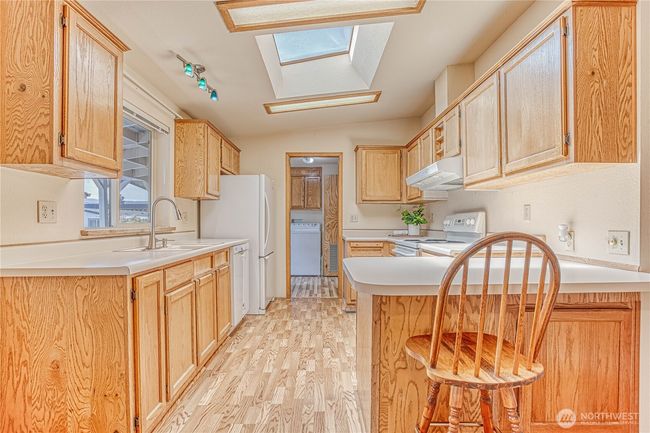 Kitchen from dining area | Image 5