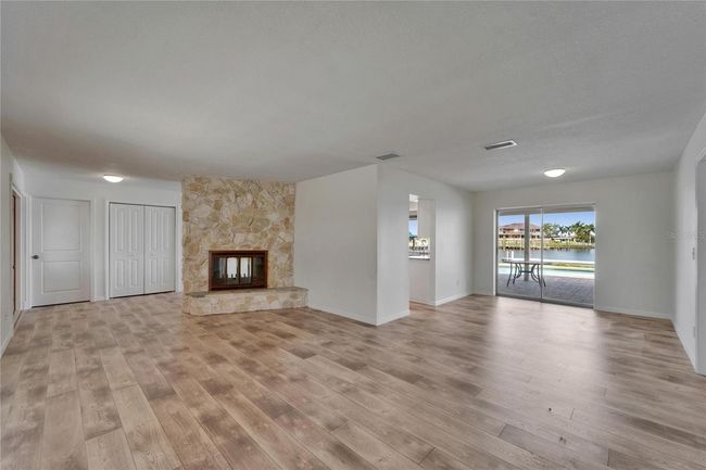 Living Room enjoys 2 way fireplace | Image 15