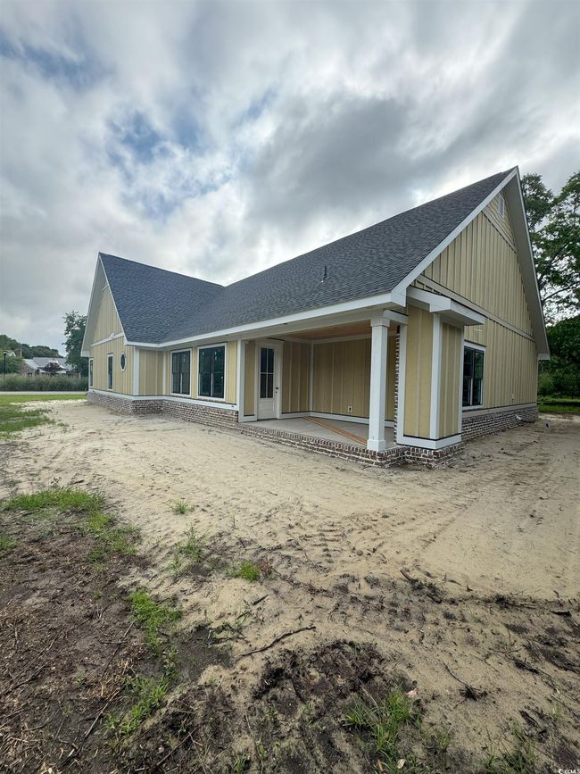 Back of property with roof with shingles | Image 9