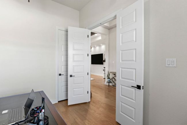 Office featuring wood finished floors | Image 8