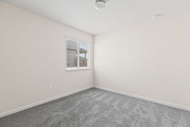 Carpeted empty room featuring baseboards | Image 17