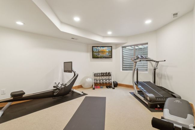 Exercise area with recessed lighting, carpet floors, and baseboards | Image 52