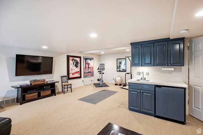 Living room featuring light carpet and recessed lighting | Image 23