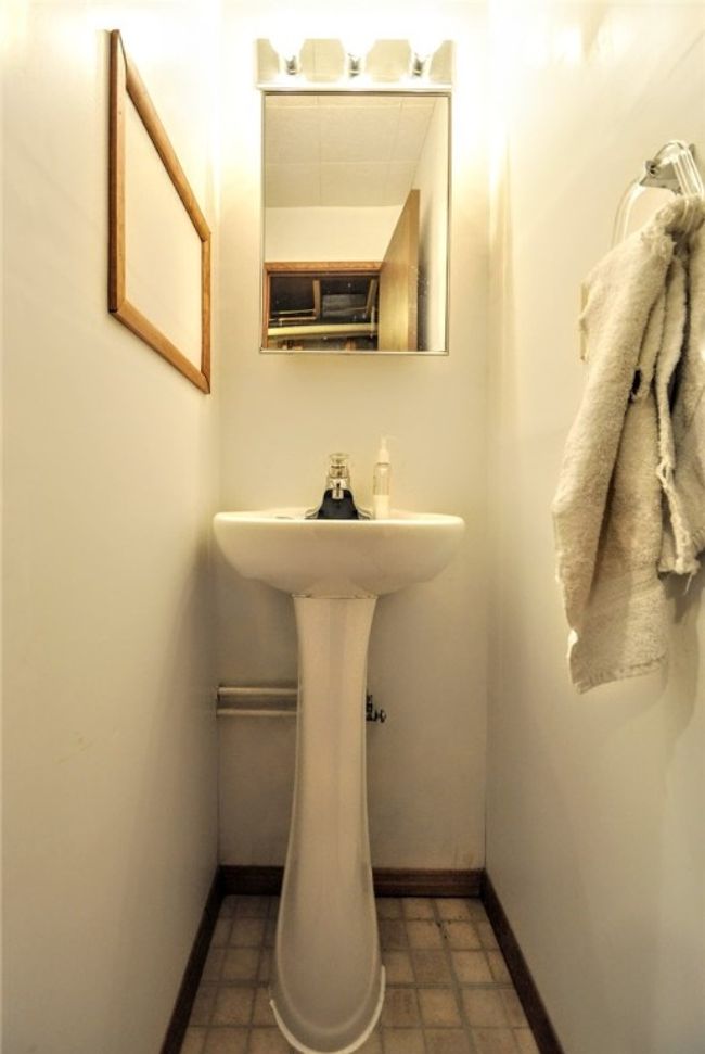 sink in the full bath on the lower level | Image 39