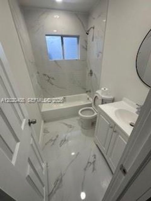 a-1311 Ne 210th Ter, Miami, FL, 33179-2030 | Card Image