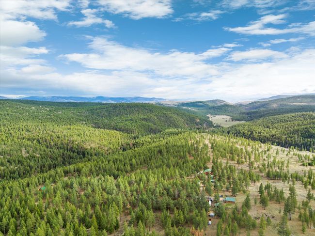 Property view of mountains with a view of trees | Image 54