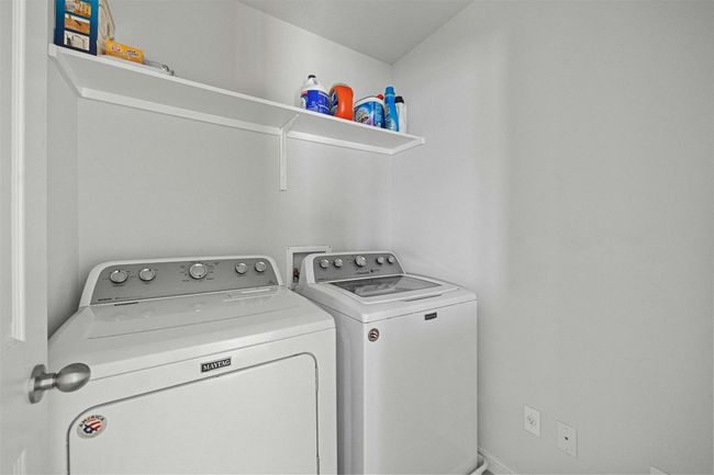 Laundry closet upstairs near secondary bedrooms | Image 22