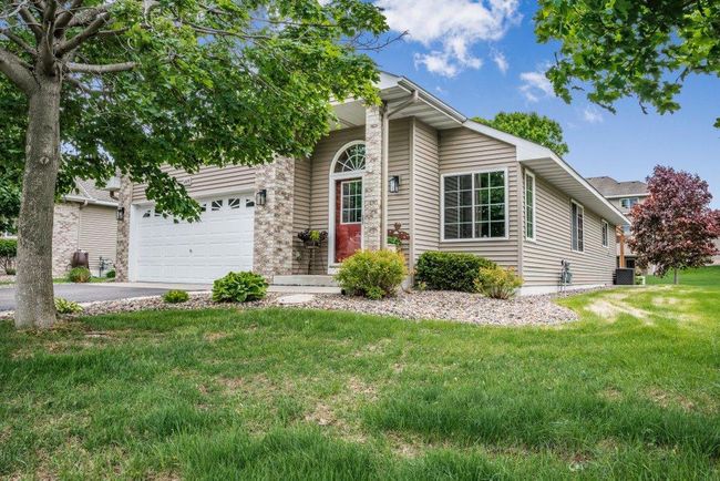 Concrete apron enhancing the curb appeal and landscape. | Image 31