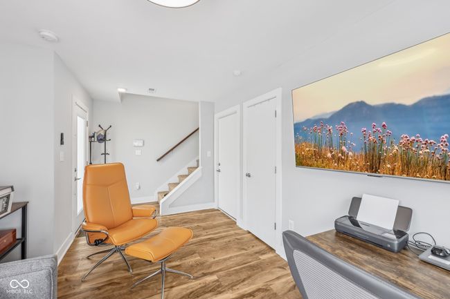 home office with baseboards and wood finished floors | Image 10