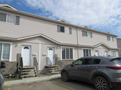 320 - 4811 47 Ave, Home with 4 bedrooms, 2 bathrooms and 2 parking in Lloydminster SK | Image 1