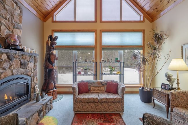 Living room with wall of windows | Image 10