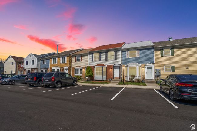 Exterior space with uncovered parking, entry steps, and a residential view | Image 24
